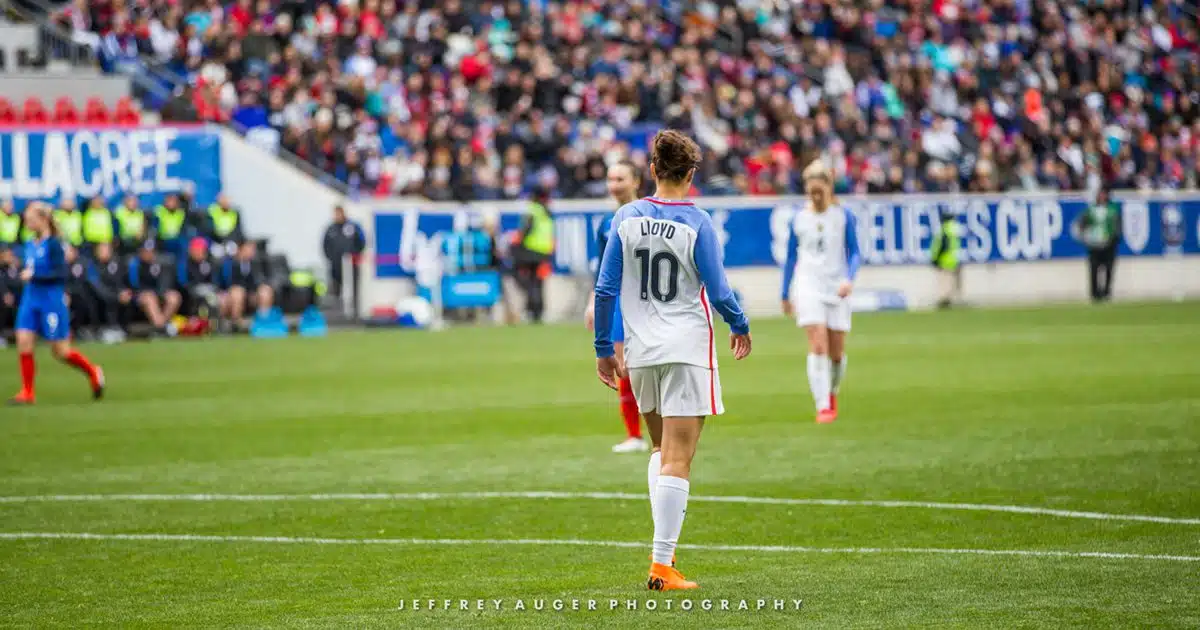 Carli Lloy on the field at Red Bull Arena during SheBelieves Cup.