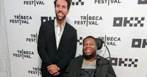 Paul Rabil and Eric LeGrand pose for a photo at the Tribeca Film Festival.
