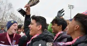 A Tennessee youth soccer team celebrates its State Cup Championship.