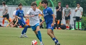 A CT Rush player looks to dispossess an opposing player at the Eastern Regional Championships.