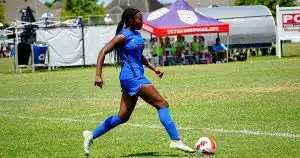 A player from TSC Murfreesboro 05G Showcase drives upfield during an 18U Semifinal Match at Southern Regionals.